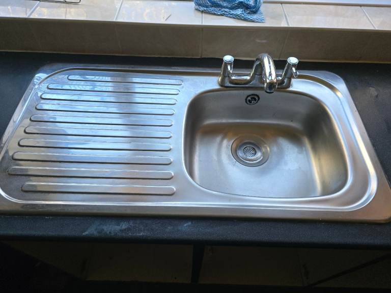 Kitchen sink plus taps
