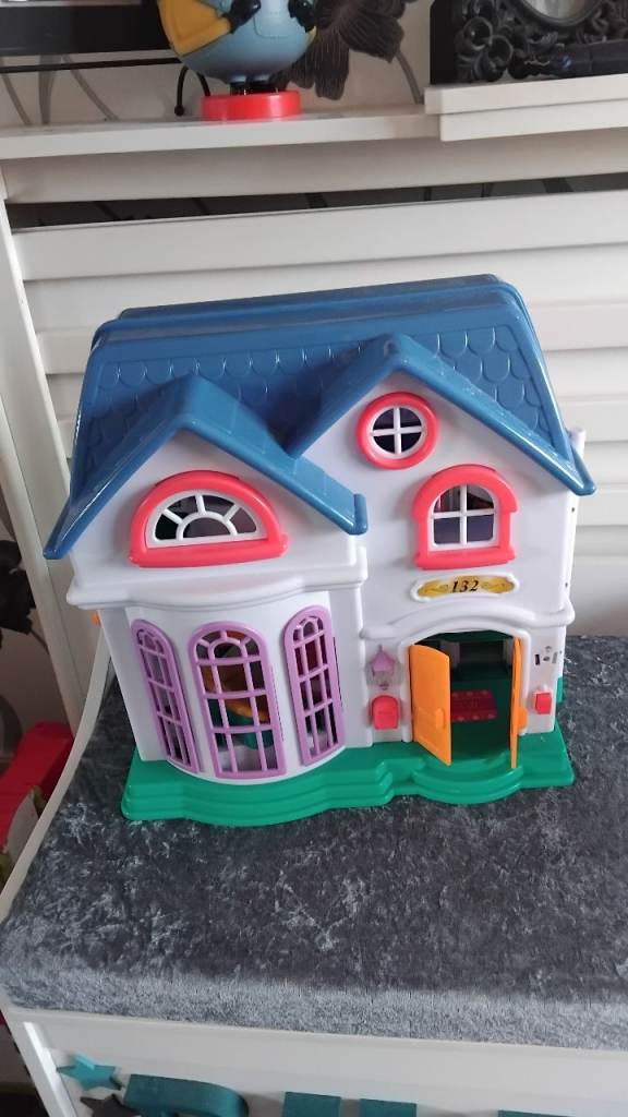 Toy House with furniture animals and buildings 