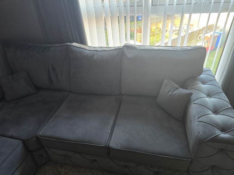 Grey L shape couch and footstool