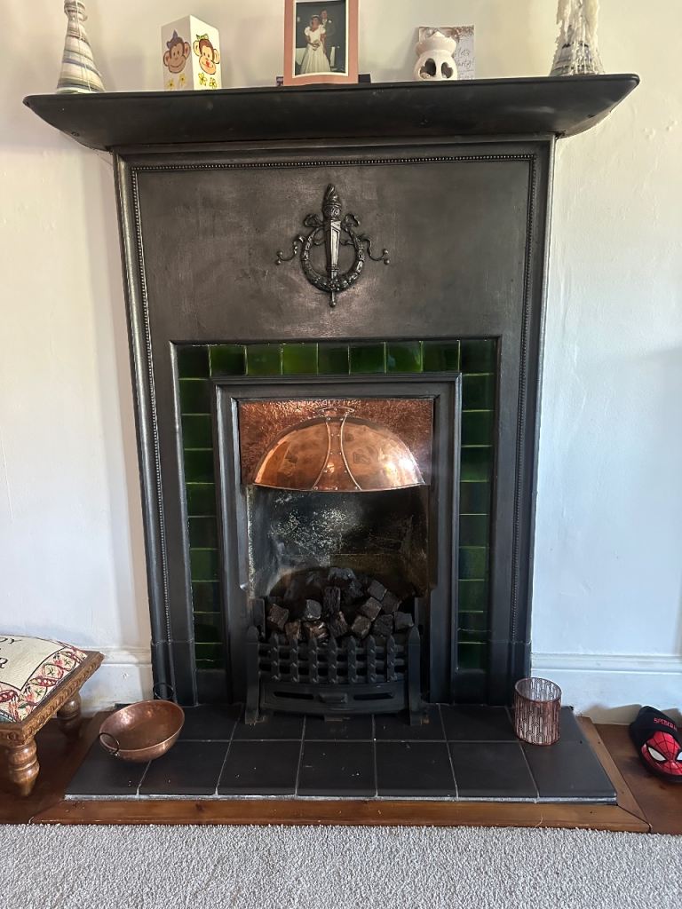 Cast Iron Fireplace with Copper Hood and Green Tiles