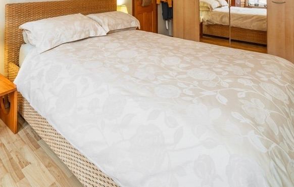 Unusual Wicker king size bed frame for sale