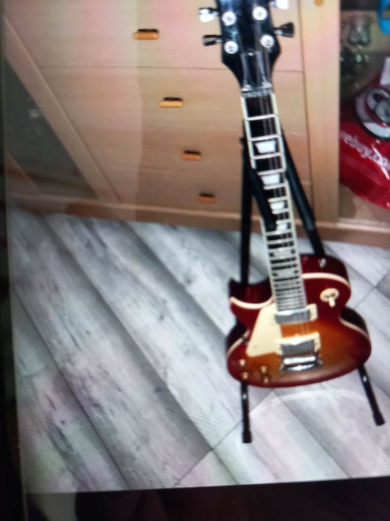 Left hand guitar and  amp