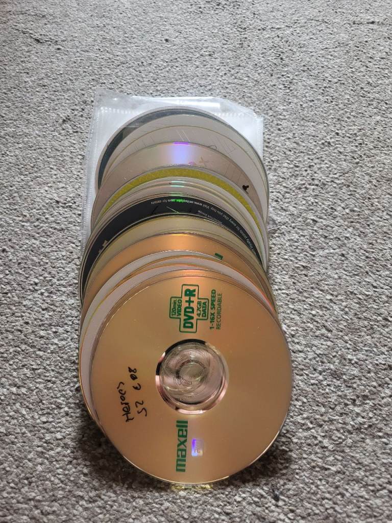 FREE - job lot of old, burned CDs and DVDs ideal for crafters, gardeners to reuse