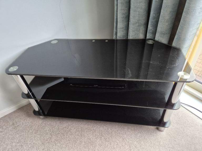 Black glass and chrome TV stand - 105cm wide x 45cm deep x 52.5cm tall