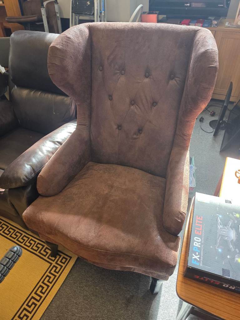 Brown suede wingback chair