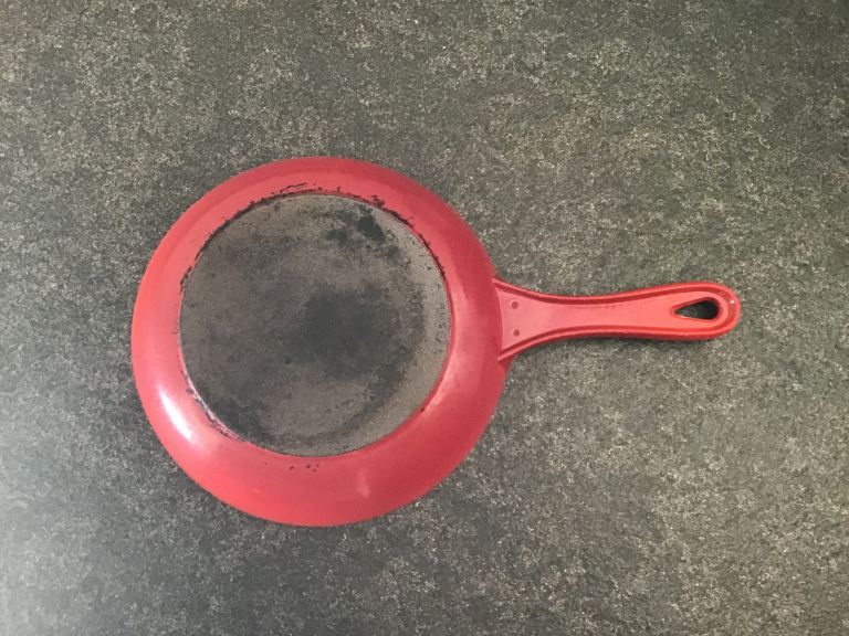 Le Creuset red cast iron frying pan