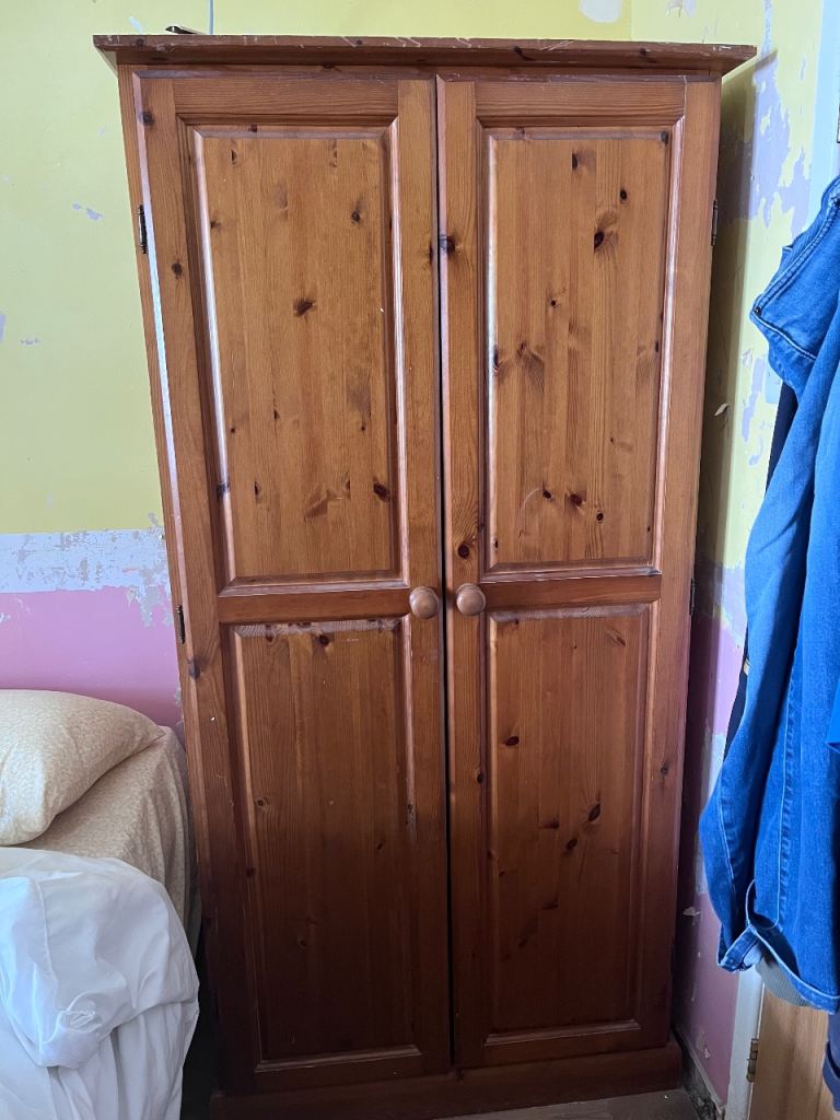 Pair of solid pine wardrobes 