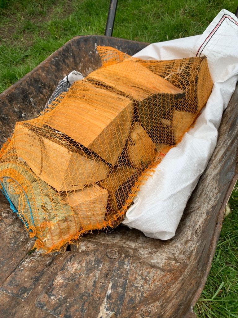 Large net of chunky hardwood logs 