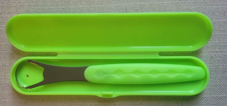 Tongue scraper with matching travel case