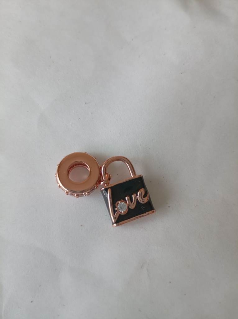 Genuine Pandora 14ct rose gold plated love charm