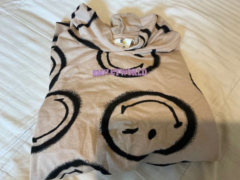 Girls hoodie smiley world from H and M age 12-14 years
