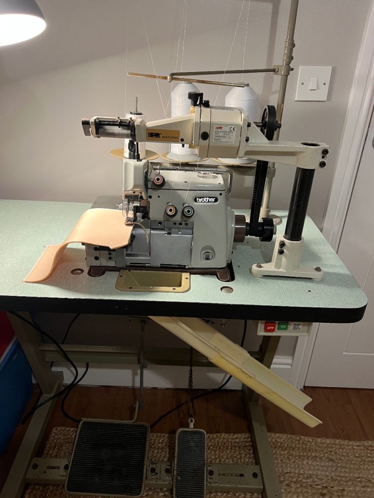 Overlock machine on table single needle 3 thread excellent working condition 
