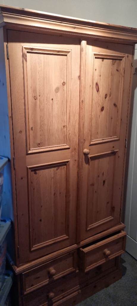 image for Pine wardrobe wotb 4 drawers underneath.