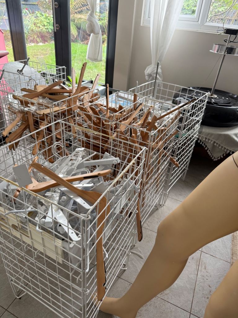 Clothes shop or clothing boutique display clothes dump baskets