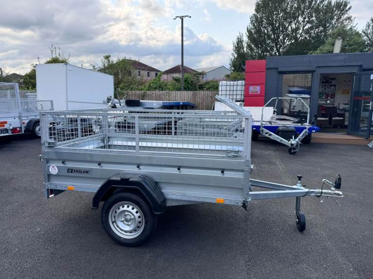 BRAND NEW ZASLAW 205SU SINGLE AXLE 7X4 TRAILER WITH 40CM MESH TIPPING