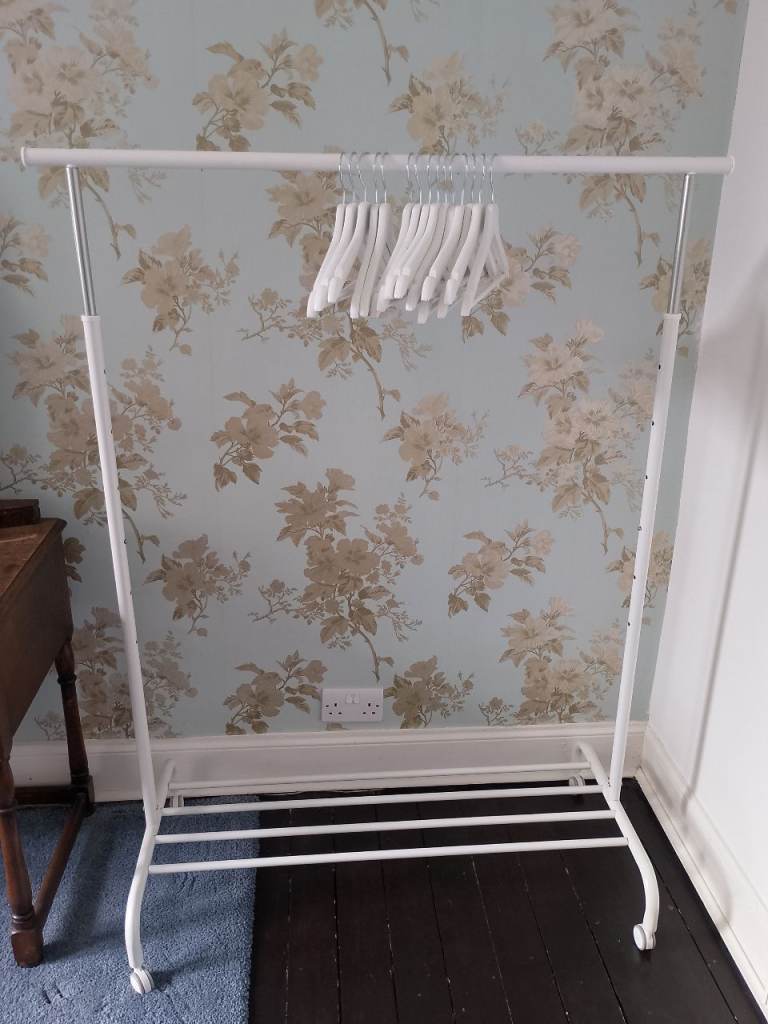 IKEA Rigga clothes wrack with IKEA Bumerang clothes hangers. 