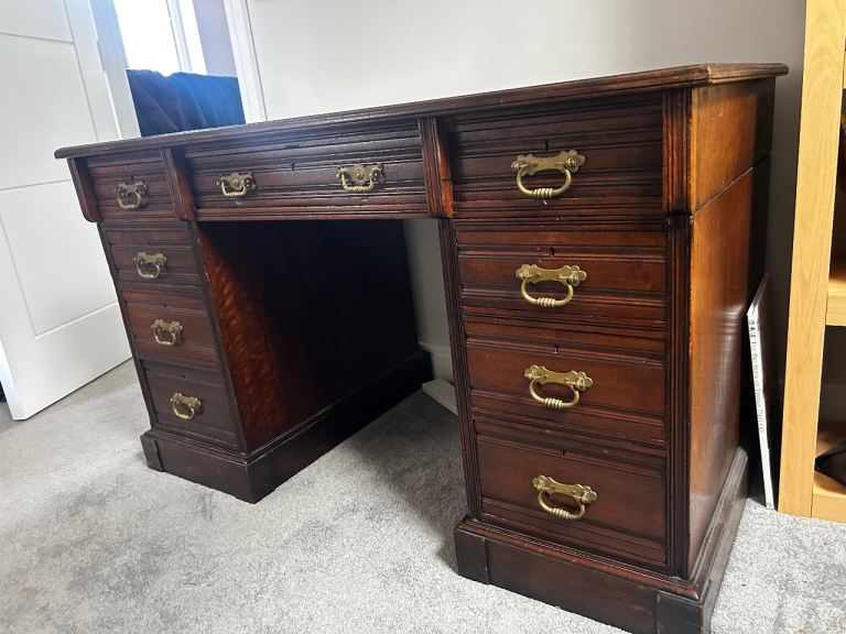 Antique pedestal bankers desk with leather top 