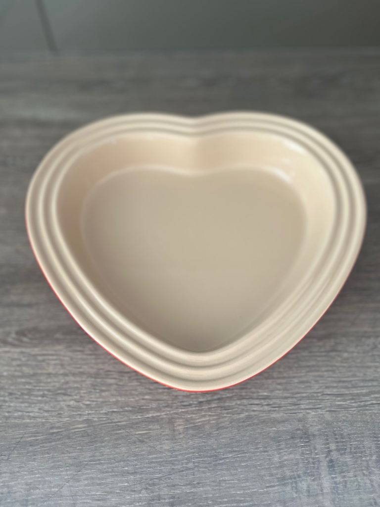 Genuine Le Creuset stoneware heart shaped pie dish or serving dish in Cerise (red)