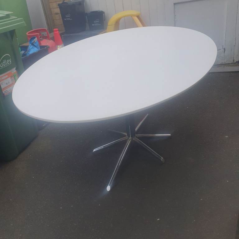 Lovely , White & Chrome Dining Table, 67 x 43 x 30 inches , Good Condition.