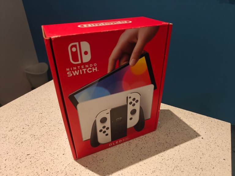 Nintendo Switch OLED Model - includes 128Gb SanDisk MicroSD card