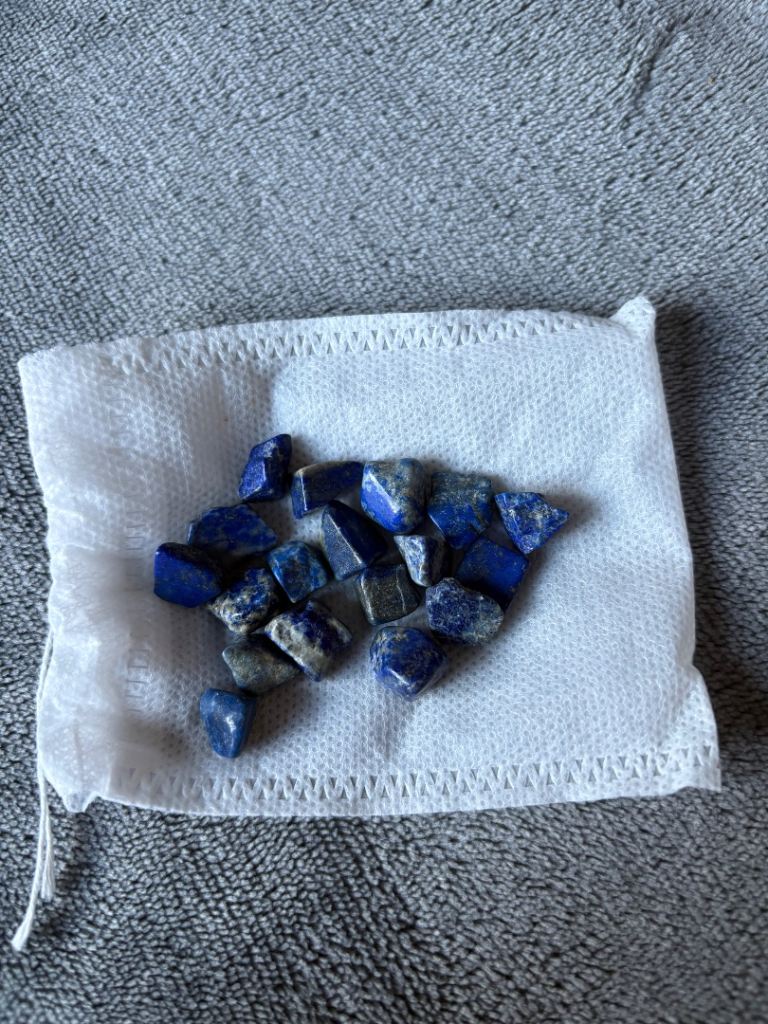 Various pieces of lapis lazuli, deep blue metamorphic rock semi precious stone & carnelian stone