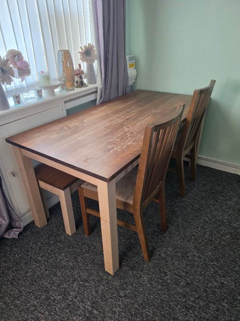 Wooden dining table with bench and 2 chairs