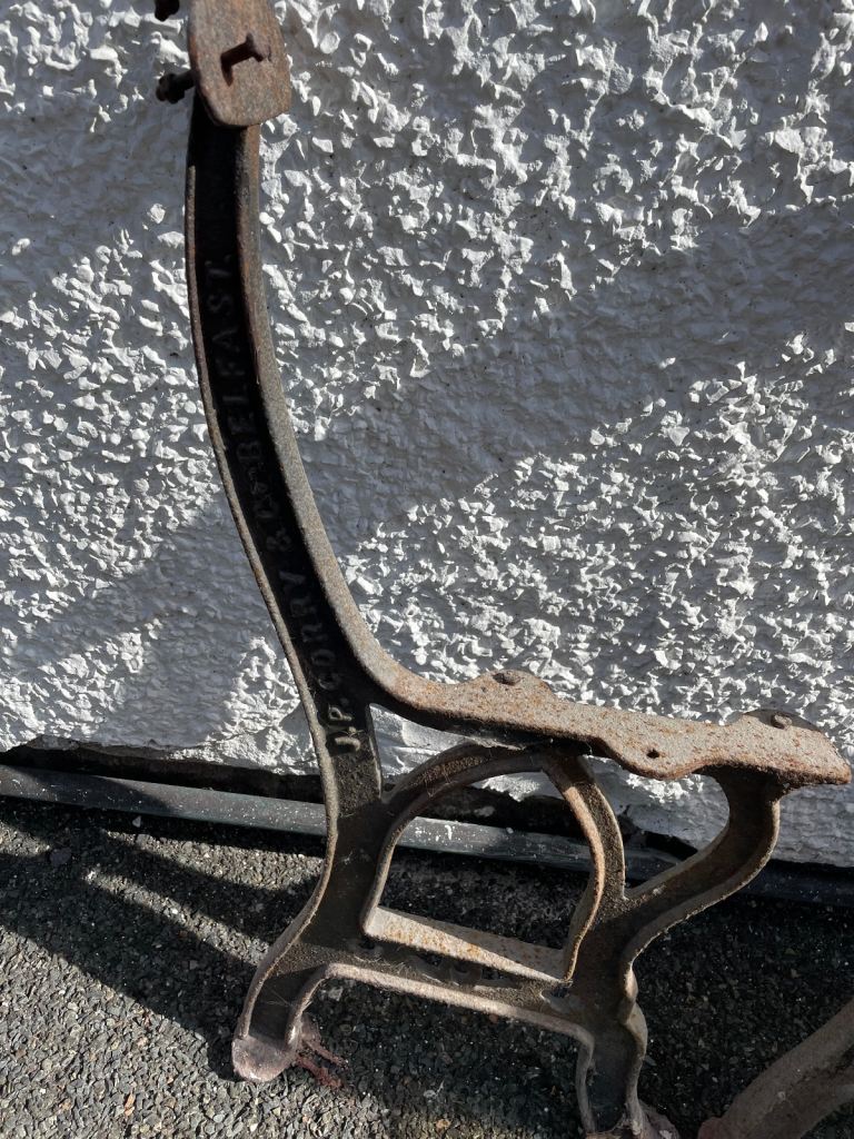 1920s J. P. Corry Belfast cast iron seat ends 
