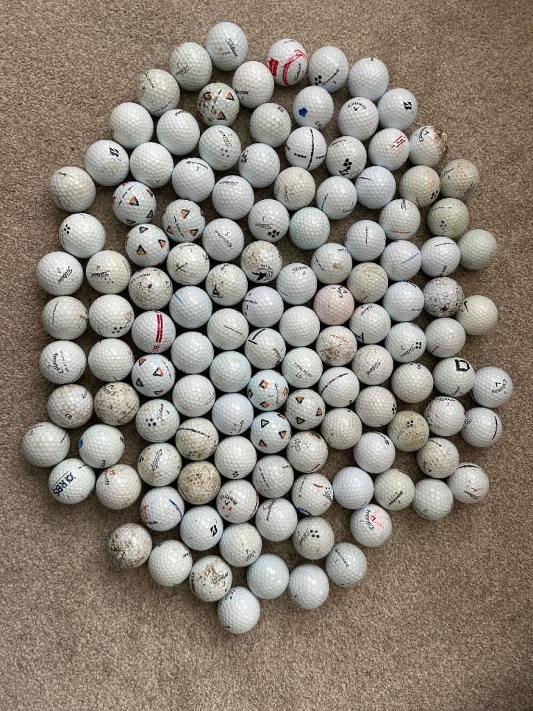 Over 100 used golf balls - many different brands