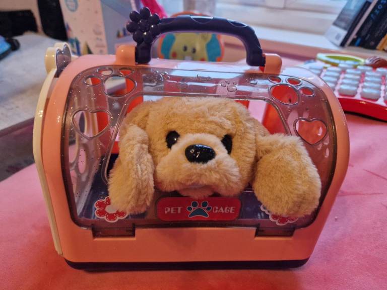 Fluffy dog with Cage