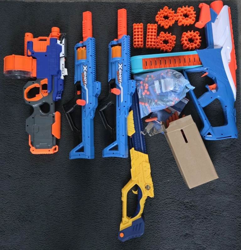 Bundle of Nerf and x Shot Guns with Bullets. Various Brands.