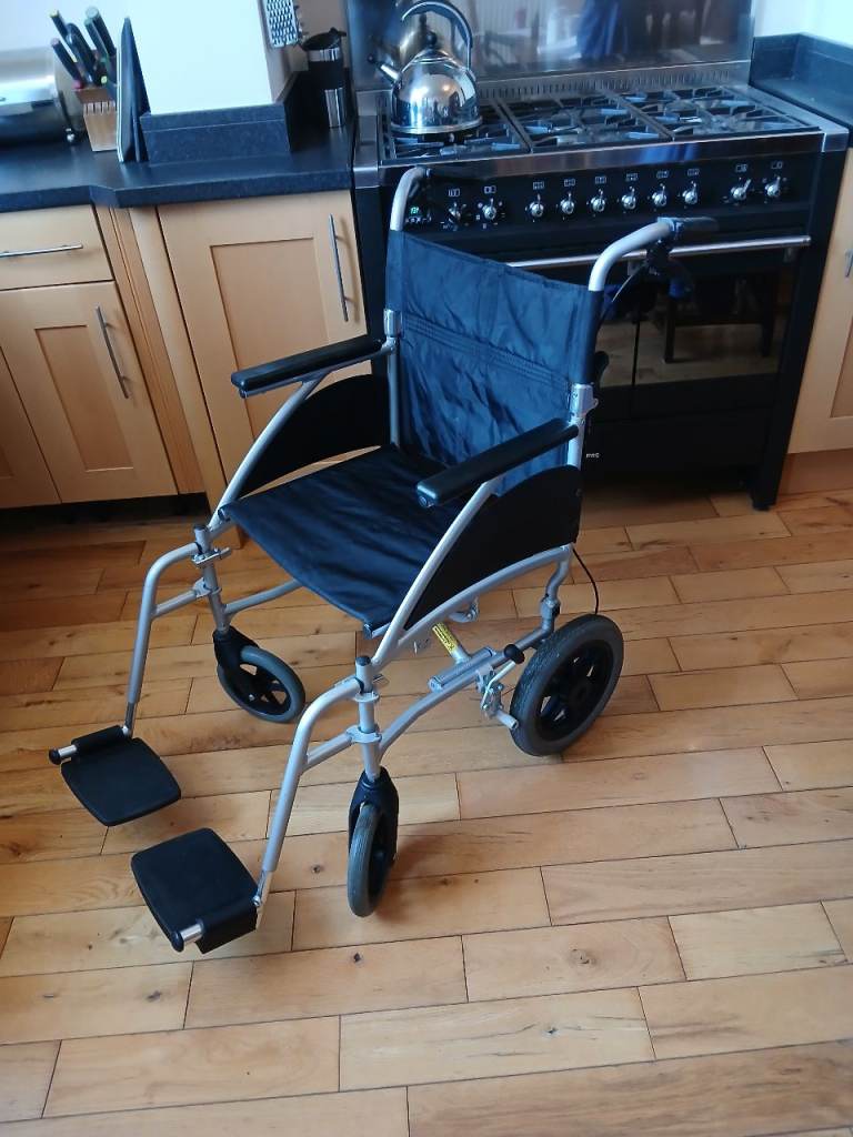 Leeds 15. Lightweight Bariatric wheelchair (12kg) with a thick cushion. 