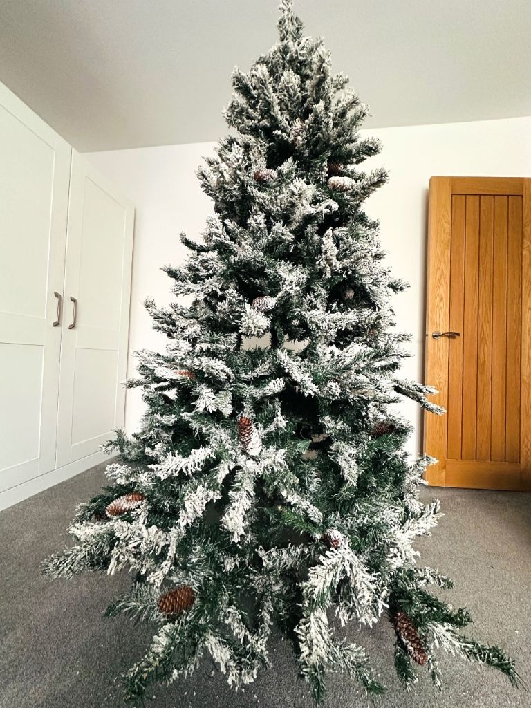 Snow covered artificial Christmas tree 7ft 