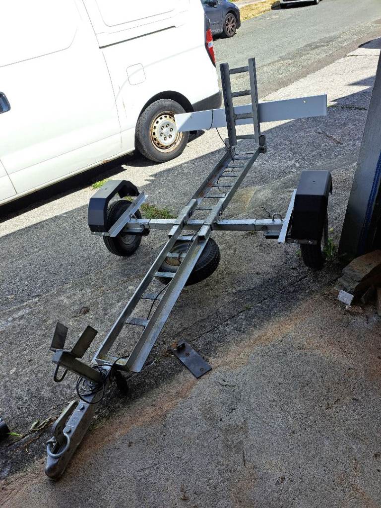 Motorcycle trailer that dismantles for storage