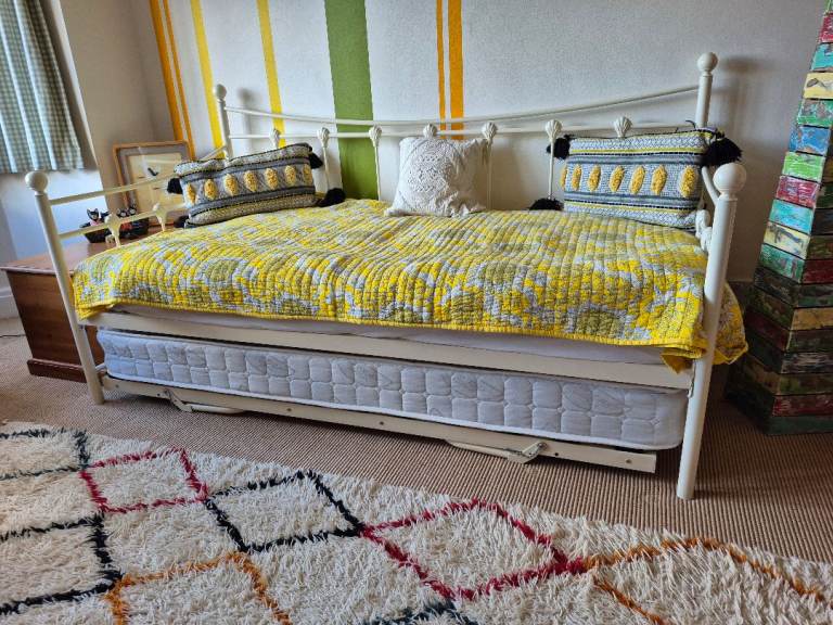 Guest bed with trundle below, converts to double, cream frame  
