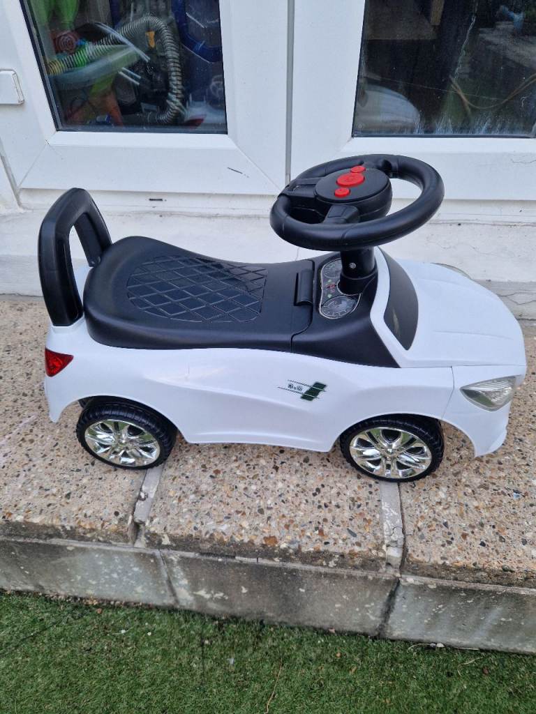 White Kids Ride-On Push Car – Good Condition