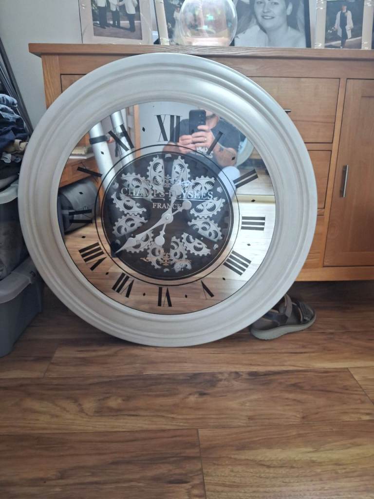 Large Round Wall Clock with Mirrored Face and Roman Numerals