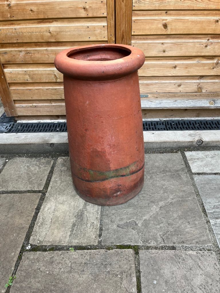 A large round terracotta chimney pot for the garden.