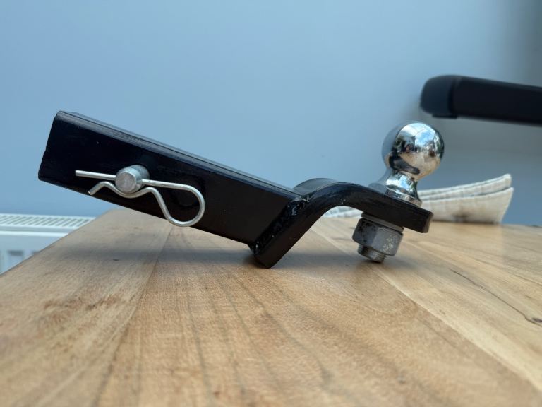 tow ball hitch with a drop plate and hitch pin