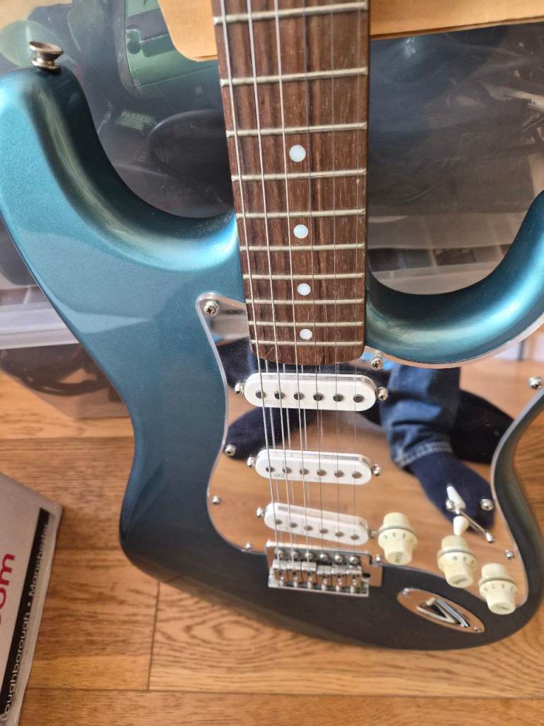 Electric guitar for sale. Comes with free case,sound effects and amp