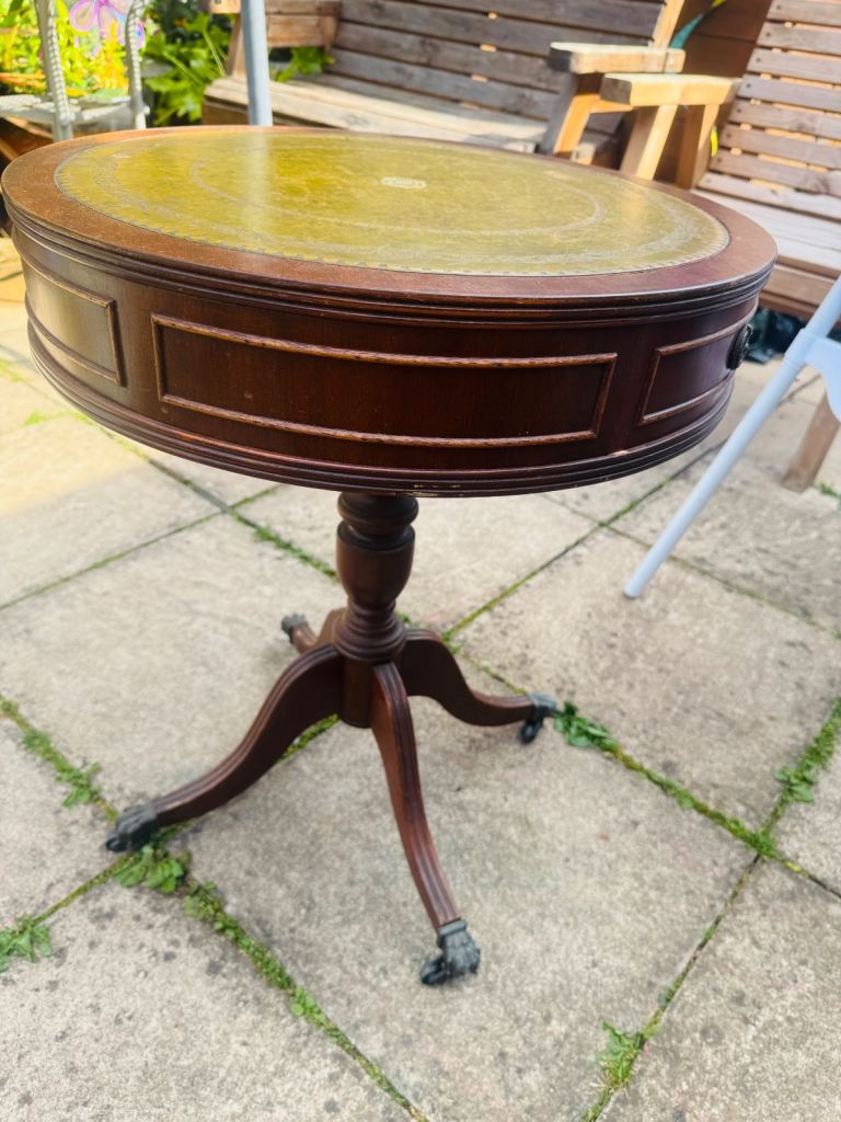 Vintage small round table with original features