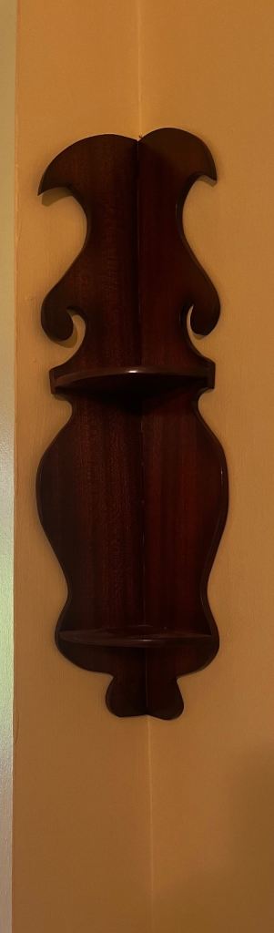 Pair of small mahogany corner display shelves