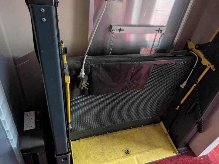 Fold over wheel chair lift