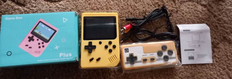 Game Box plus Yellow Handheld games console with 520 build in retro games unused in original box