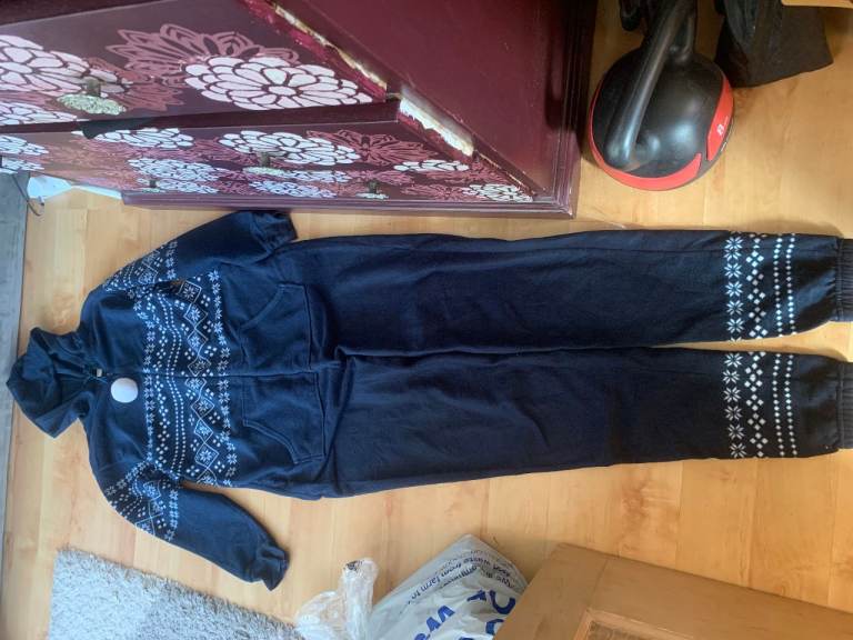 Attractive, well made, warm onesie, size 8, not worn