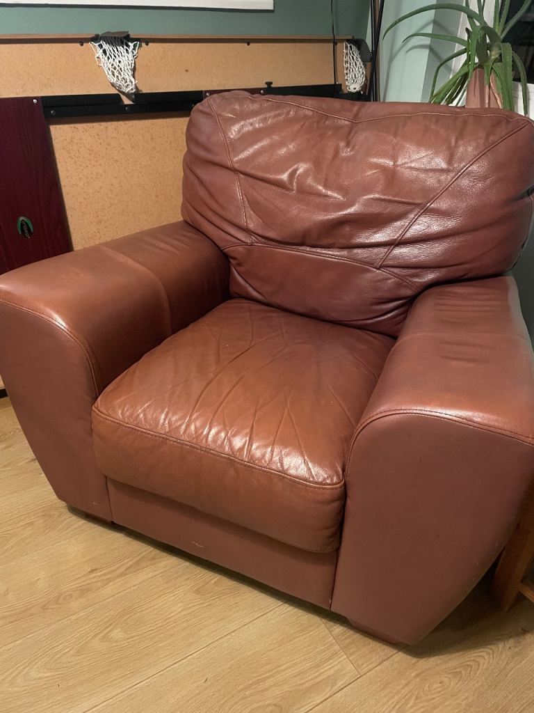 Brown leather armchair- good condition 