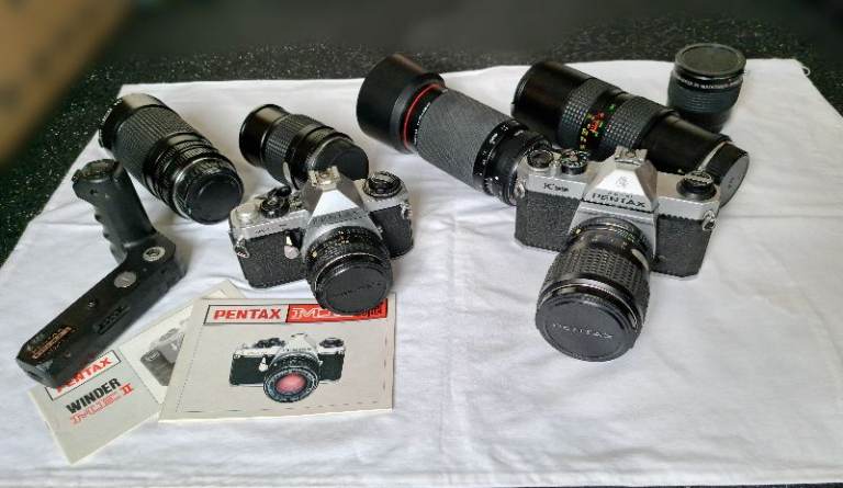 Pentax K1000 and ME Super SLR Cameras with Lenses and Winder
