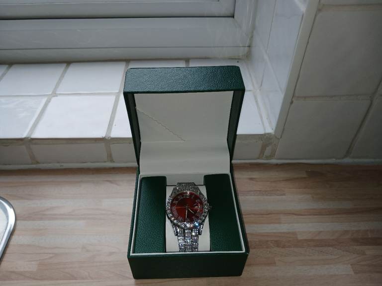 Iced Out Red Dial Watch