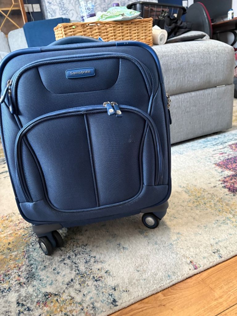 Two Blue Carryon Suitcases