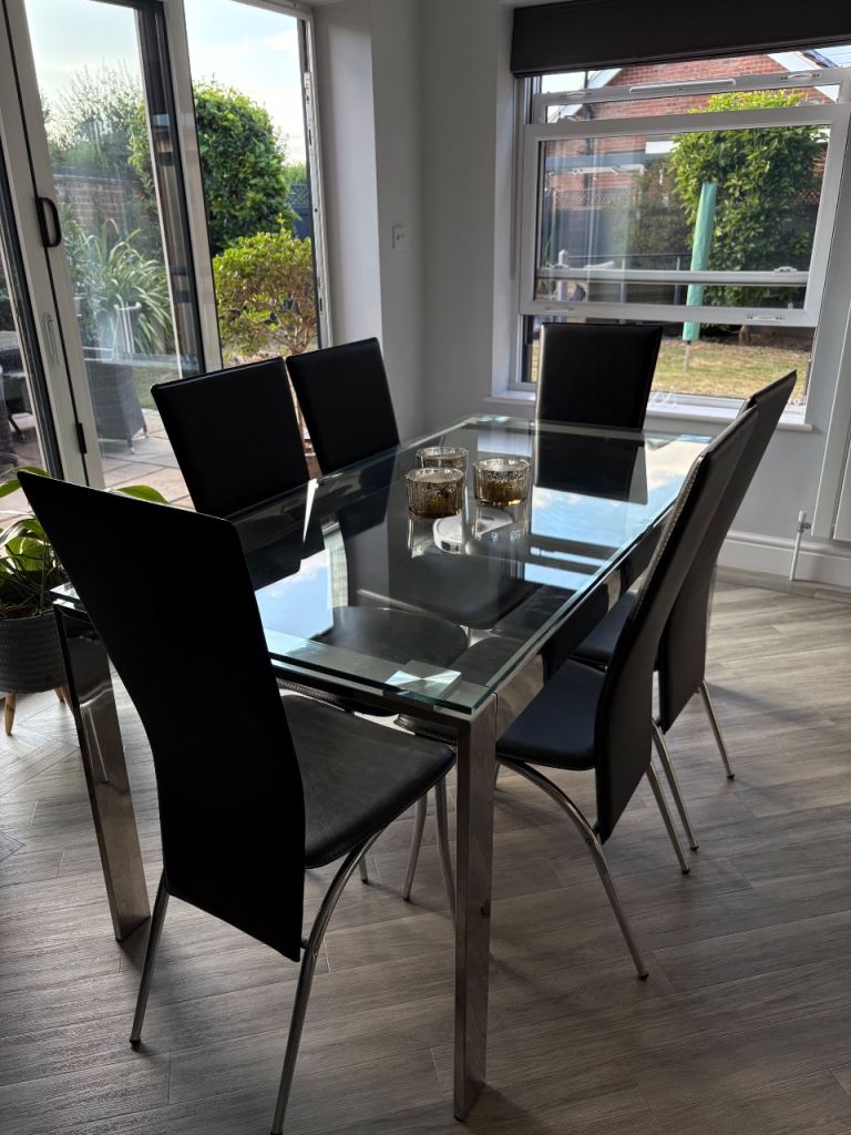 Glass Dining Table & 6 Black Faux Leather Chairs - Good Condition