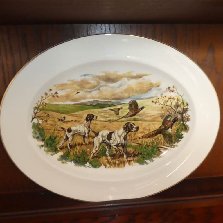 Lovely oval  display plate featuring English pointers.